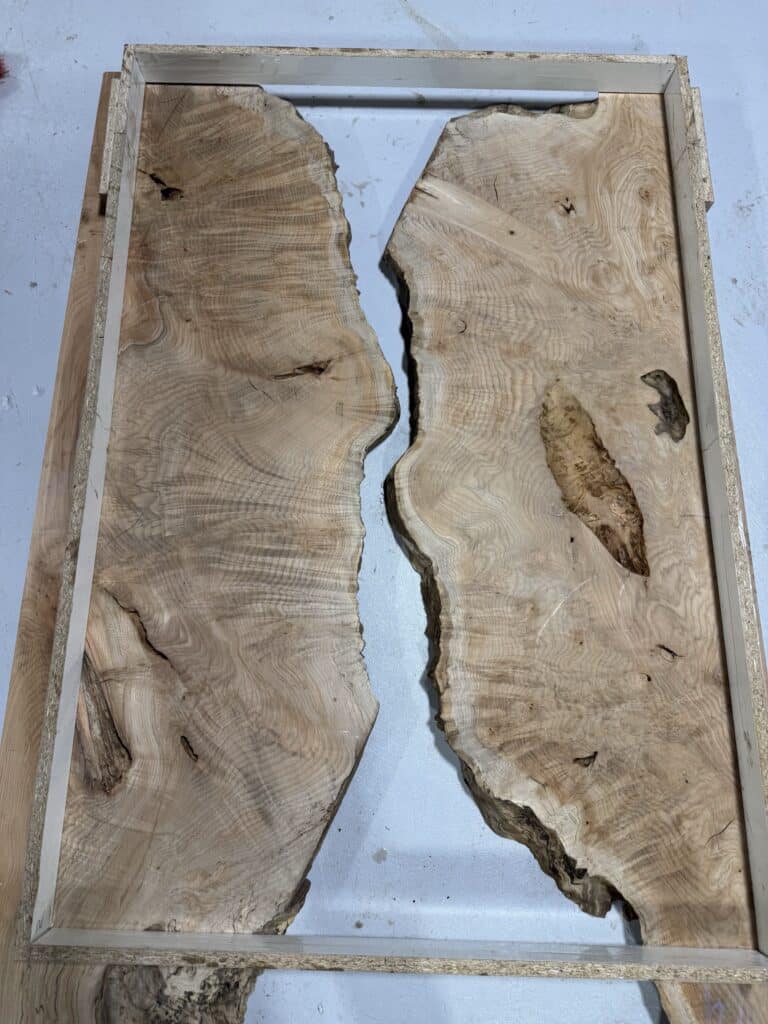 Rajan Table - Figured maple slabs in epoxy form